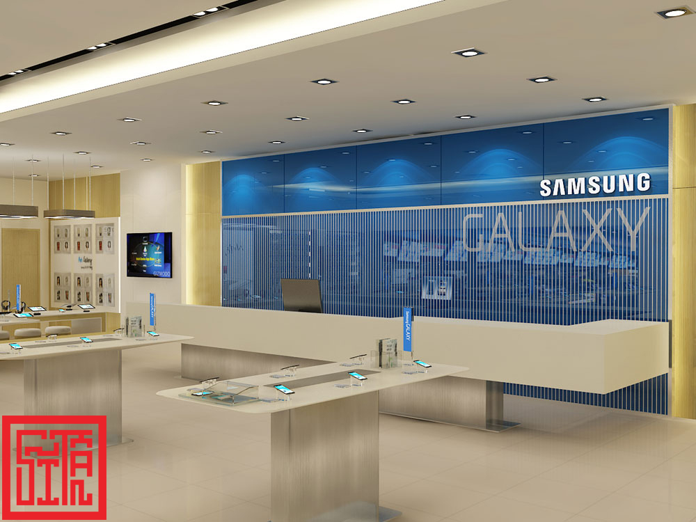 Quầy lễ tân showroom Samsung Vincom B được Sĩ Tấn thiết kế với điểm nhấn ánh sáng xanh đặc trưng. 
