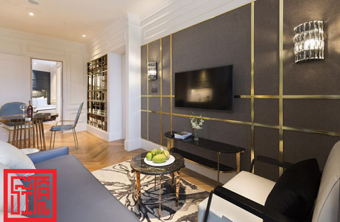 Phòng khách khách sạn Bach Suites Saigon do Sĩ Tấn thiết kế & thi công.